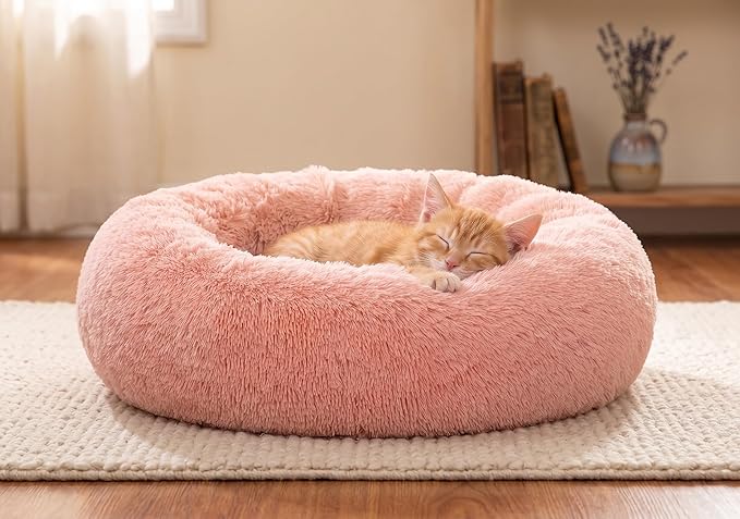 SAVFOX 20 inches Calming Donut Dog Bed - 3X Durable Plush Faux Fur, Machine Washable & Non-Slip, Fits up to 15 lbs, Pink